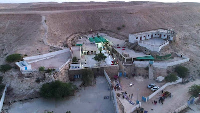 Aerial view of the Kalka Devi Temple nestled in the Kalka hills near Rohri, Sukkur, captured by a drone