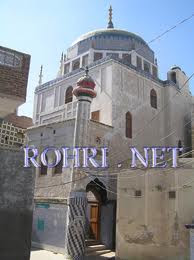 Close-up of the broken main gate lock at the Moe-e-Mubarak shrine following a recent theft attempt, highlighting the desecration of this sacred site. Exterior view of the Moe-e-Mubarak shrine, a historical and spiritual landmark in Rohri, Sindh, Pakistan, known for housing a sacred relic of the Prophet Muhammad (PBUH).