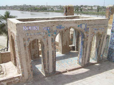 Traditional Sindhi Tile Artwork at the Seven Sisters' Shrine Colorful turquoise and yellow enameled tile patterns decorating a tomb at Satyan Jo Astano, Sindh.