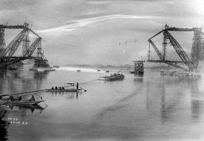 Historical 1888 image of Lansdowne Bridge Rohri under construction, with barges and workers assembling the steel cantilever structure over the Indus River