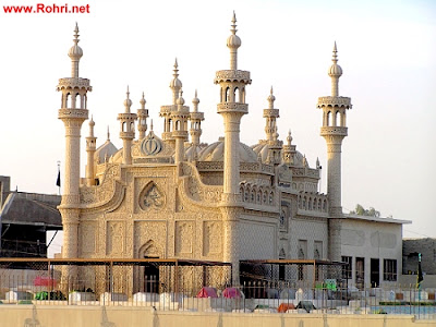 Jan Allah Shah Janshahi Shrine – Rohri’s Icon of Devotion and Heritage Tomb of Jan Allah Shah Janshahi in Rohri, Sindh, featuring intricate Islamic architecture with domes, minarets, and carved stonework. A revered spiritual site and heritage landmark.