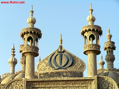 Intricate Minarets of Jan Allah Shah Janshahi’s Tomb – Rohri’s Architectural Gem Close-up of ornate minarets and dome at the Tomb of Jan Allah Shah Janshahi in Rohri, Sindh. Features detailed Islamic carvings and calligraphy symbolizing spiritual devotion.