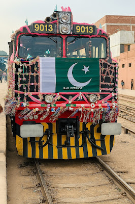 Celebrating Azadi Day 2025: A Journey Through Pakistan's Independence Day Train Azadi Day celebration 2025 Train engine 9013 decorated Pakistani flag on train Rail Eyeshot patriotic display Sindh railway heritage National day train decoration