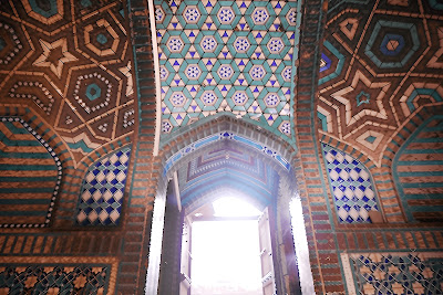 Interior Mosaic Ceiling of Sateen Jo Aastan: Tomb of the Seven Sisters in Rohri, Pakistan Intricate turquoise and blue mosaic tile ceiling with arches and light-filled doorway in Sateen Jo Aastan interior, Rohri, Sindh, Pakistan