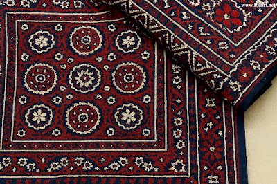 Ajrak – Sindhi Heritage in Indigo and Crimson Traditional Sindhi Ajrak fabric with geometric and floral block-printed patterns