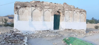 Graves of Devout Women near Hasil Shah’s Shrine – Rohri’s Spiritual Folklore Graves of revered women near Hasil Shah’s shrine in Rohri, Sindh — a sacred site marked by flags, stone enclosures, and spiritual tradition. A cultural landmark reflecting Sindh’s devotional heritage and local oral history.