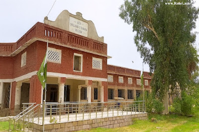 Historic Power House Sukkur – A Forgotten Landmark Opposite WAPDA Office Shattered remains of the original Power House on Minara Road, Sukkur—partially repurposed by WAPDA, surrounded by overgrown vegetation and crumbling walls, symbolizing heritage neglect in Pakistan.