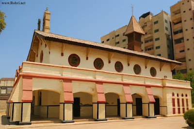 Side Facade of Saint Saviour's Church Sukkur: Colonial Architecture in Sindh Side view of Saint Saviour's Anglican Church Sukkur featuring arched windows and colonial British-era design